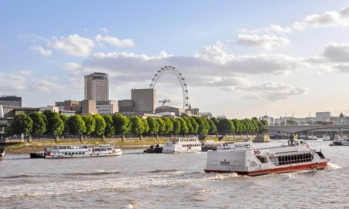 Boats on River Thames in London, United Kingdom.